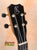 Black Kanilea KPA-C PREM headstock with silver tuning pegs and stylish K logo