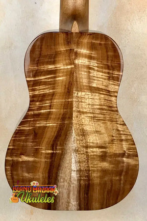 Wooden back panel of Kanilea KPA-C PREM Concert Ukulele showcasing stunning grain patterns