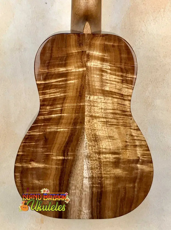 Wooden back panel of Kanilea KPA-C PREM Concert Ukulele showcasing stunning grain patterns