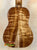 Wooden back panel of Kanilea KPA-C PREM Concert Ukulele showcasing stunning grain patterns