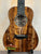 Beautiful Kanilea KPA Curly Koa Tenor Ukulele showcasing unique wood grain and rosette