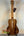 Beautiful Kanilea KPA Curly Koa Tenor Ukulele showcasing rich brown striped grain patterns