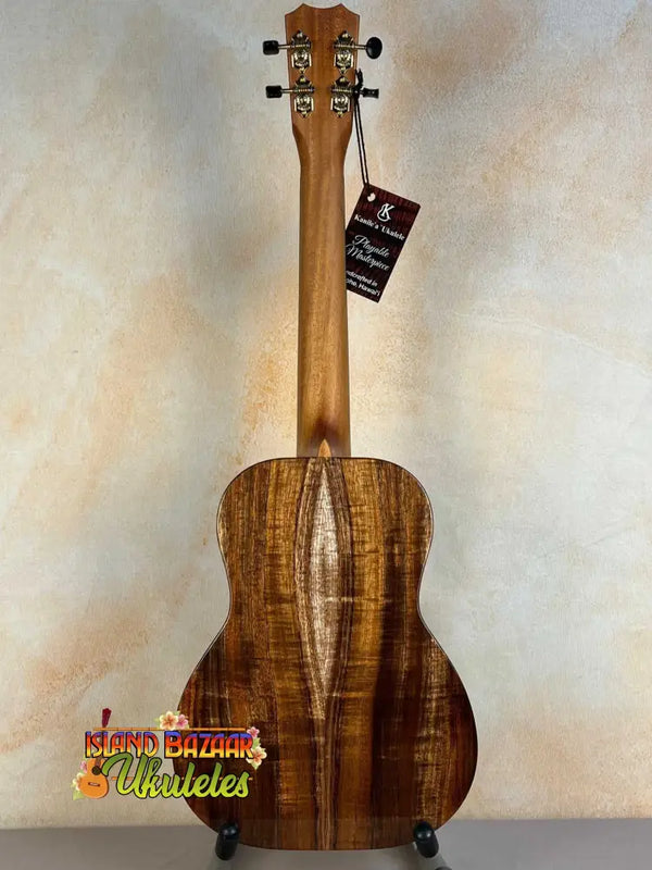 Beautiful Kanilea KPA Curly Koa Tenor Ukulele showcasing rich brown striped grain patterns