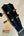 Black guitar headstock with tuning pegs on Kanilea KPA Curly Koa Tenor Ukulele