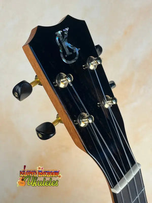 Guitar headstock with black tuning pegs on Kanilea KPA Premium Koa Tenor Ukulele