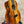 Vibrant orange-brown Kanile’a KPA Pro Tenor Koa Ukulele with abalone soundhole inlay
