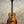 Glossy dark orange-brown Kanile’a KPA Pro Tenor Koa Ukulele with black fretboard and light rosette