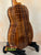Glossy brown Kanile’a KPA Pro Tenor Koa Ukulele with striped wood grain and deluxe gig bag