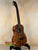 Brown wooden Kanile’a KPA Pro Tenor Ukulele with Deluxe Gig Bag displayed