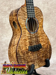 Kanileʻa kpa pro tenor ukulele with rich golden-brown solid mango body and iridescent abalone soundhole inlay