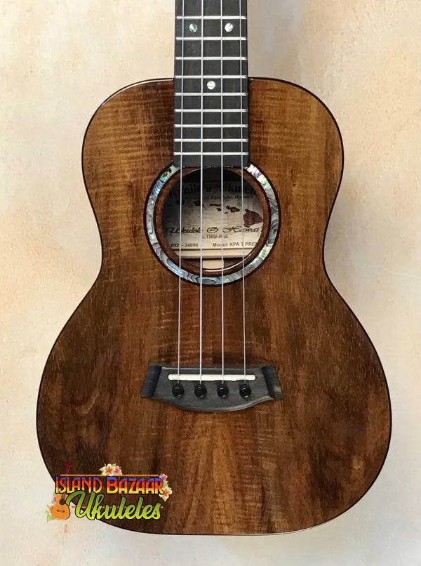 Brown Wooden Ukulele with Abalone Inlay - Kanilea KPA-T PREM Tenor Ukulele Curly Koa