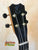 Guitar headstock with black tuning pegs on Kanilea KPA-T PREM Tenor Ukulele Curly Koa