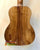 Wooden back panel of Kanilea KPA-T PREM tenor ukulele showcasing curly koa grain patterns