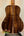 Acoustic guitar with rich brown Koa wood back on Kanilea KPA-T Tenor Ukulele Hawaiian Koa