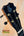 Black Kanilea KPA-T Tenor Ukulele headstock with blue inlay and gold tuning pegs