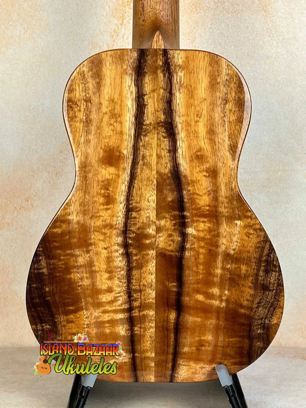 Acoustic guitar with golden-brown koa wood back for Kanilea KPA-T Tenor Ukulele