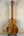Wooden acoustic Kanilea KPA-T Tenor Ukulele showcasing beautiful striped Hawaiian Koa wood