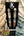Guitar headstock of Kanile’a KSR Premium Tenor Ukulele displaying KC logo and tuning pegs
