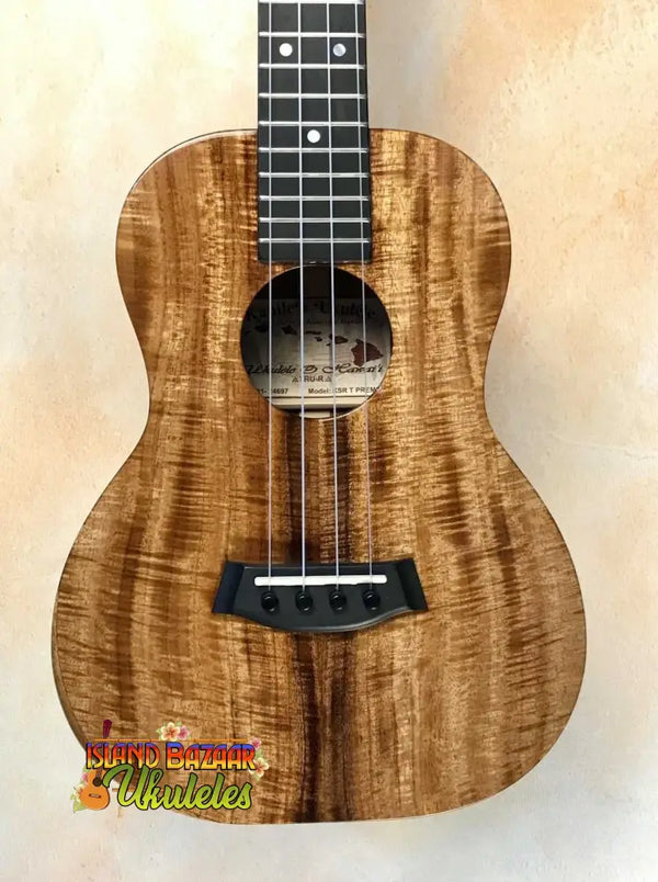 Beautiful Koa wood Kanilea KSR Premium Tenor Ukulele with wavy grain patterns