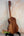 Wooden classical guitar showcasing beautiful grain in Kanile’a KTR-T Master-Grade Koa Tenor Ukulele