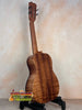 Wooden classical guitar showcasing beautiful grain in Kanile’a KTR-T Master-Grade Koa Tenor Ukulele