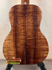 Acoustic guitar featuring stunning figured koa wood back, showcasing Kanile’a KTR-T Master-Grade