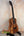 Beautiful Kanile’a KTR-T Master-Grade Koa Tenor Ukulele displayed on a black stand