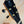 Black guitar headstock with gold tuning pegs on Kanile’a KPA-T Master Koa Tenor Ukulele