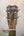 Wooden ukulele headstock showcasing Islander branding and white tuning pegs for rich tones