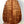 Wooden back panel of Kanile’a P-1 Pineapple Tenor Ukulele with premium koa grain