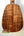 Wooden back panel of Kanile’a P-1 Pineapple Tenor Ukulele with premium koa grain