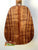 Wooden back panel of Kanile’a P-1 Pineapple Tenor Ukulele with premium koa grain