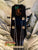 Guitar headstock with KC logo in orange and green on Kanile’a Pineapple Hawaiian Ukulele