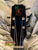 Guitar headstock with KC logo in orange and green on Kanile’a Pineapple Hawaiian Ukulele