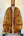 Wooden guitar back panel showcasing striking figured grain of Hawaiian Curly Koa