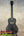 Black ukulele with red fret markers on Kanileʻa Pōhaku T Pro solid maple tenor ukulele