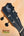 Black headstock of Kanile’a Premium Silk Tenor Ukulele K-2 with silver tuning pegs