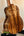 Kanile’a Super Tenor D-Hole Premium Koa Ukulele showcasing beautiful koa wood grain