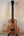 Beautiful Kanile’a Super Tenor Ukulele showcasing premium koa wood and sleek black hardware