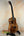 Brown wooden ukulele Kanile’a Tenor D-1 with solid Hawaiian Koa and deluxe gig bag