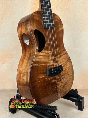 Brown wooden ukulele Kanile’a Tenor D-1 with solid Hawaiian Koa and deluxe gig bag