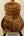 Wooden ukulele back featuring striking grain pattern of Kanile’a Tenor D-1 with deluxe gig bag