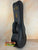 Black hardshell case with brass latches for KTM-00 Tenor Ukulele, ensuring protection and style