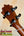 Guitar headstock with black tuning pegs on KoAloha Concert Hawaiian Ukulele, Solid Koa