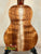 KoAloha Concert Hawaiian Ukulele featuring a stunning figured Solid Hawaiian Koa back panel