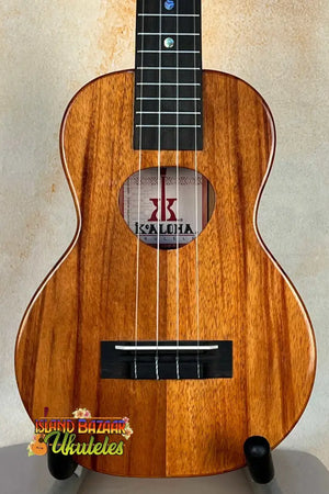 Wooden Kalilia brand Ukulele in solid Hawaiian Koa, KoAloha KCM-00 Concert, buffed high gloss