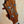 Guitar headstock with decorative inlay and tuning pegs on KoAloha KCM-00 Concert Ukulele