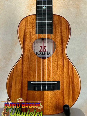 Wooden Kalilia brand Ukulele in solid Hawaiian Koa, KoAloha KCM-00 Concert, buffed high gloss
