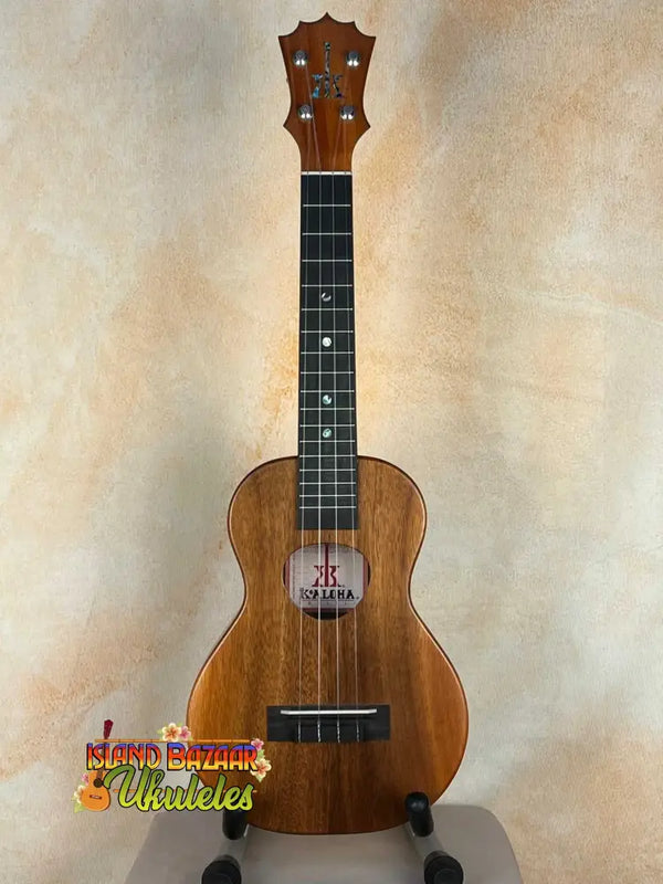 KoAloha KCM-10 Concert Ukulele in Solid Hawaiian Koa with dark fretboard and natural finish