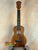 KoAloha KCM-10 Concert Ukulele in Solid Hawaiian Koa with dark fretboard and natural finish